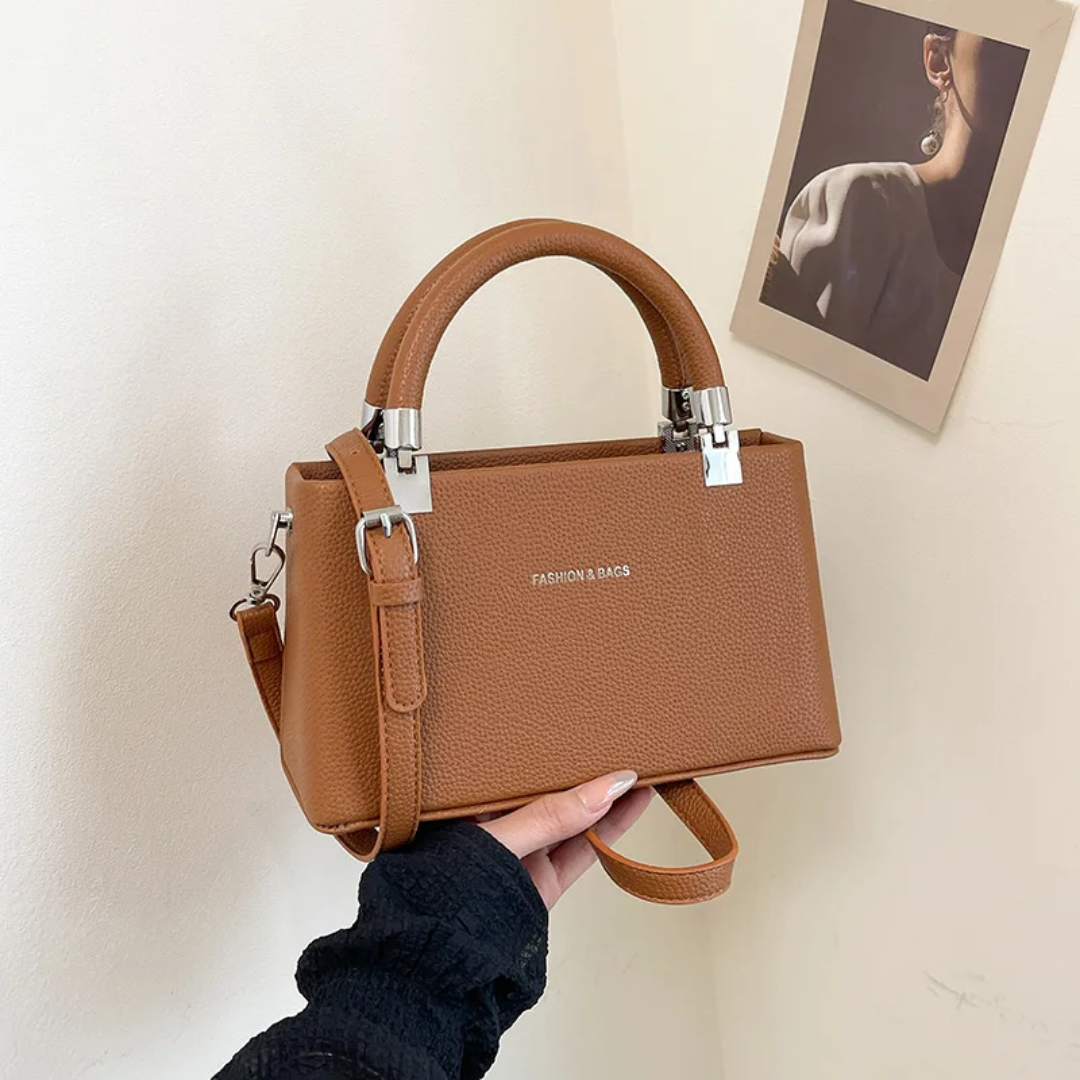 https://dantty.com/product/small-faux-leather-top-handle-bags-with-a-crossbody-strap-option-/5161
