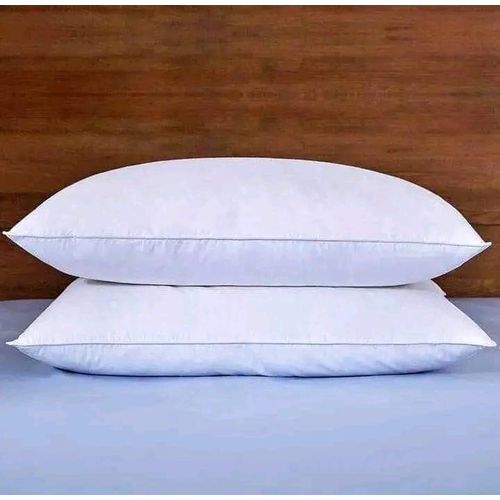 A pair of large fibre pillows- white
