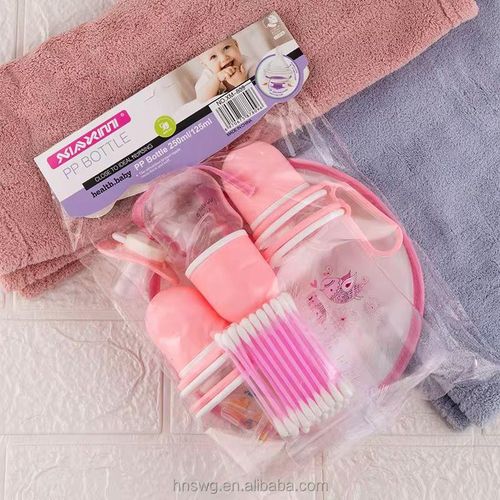 A Set Of Three Baby Bottles With Helpers - Pink