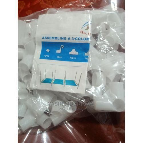 A Pack Of 48 Plastic Joints For 3 Column Wooden Wardrobes, White