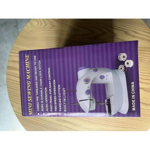 Mini Portable Sewing Machine That Uses Either Electricity Or Battery Cells - Multicolor