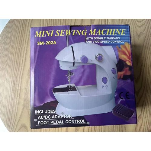 Mini Portable Sewing Machine That Uses Either Electricity Or Battery Cells - Multicolor