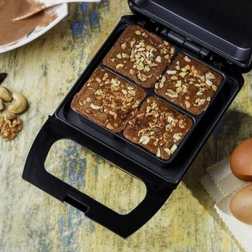 Geepas 4Pcs Brownie Maker, 4 Bites At A Time ,Non-Stick Cooking Plate , Safety Lock , Cool Touch Handles , Skid -Resistance Feet , Power On & Ready Indicator - Black