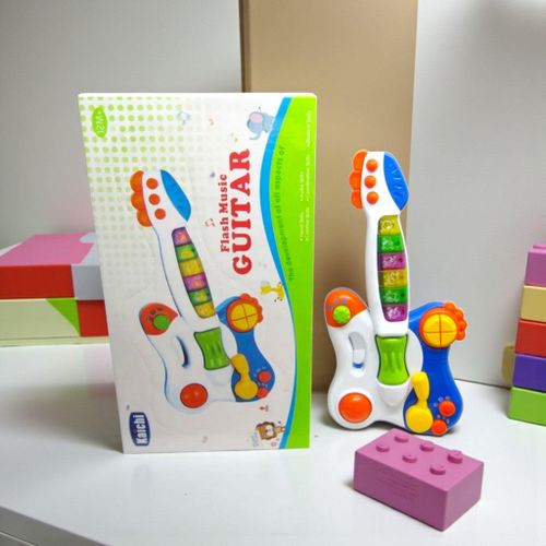 Baby Rocking Light up Guitar Toy White Glue