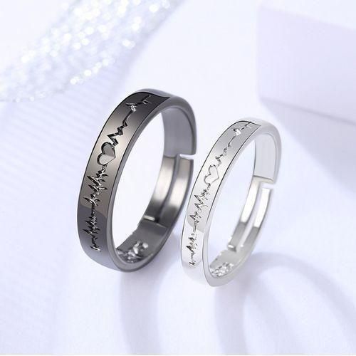 A Fashionable Couple's Adjustable Black And White Electrocardiogram Ring